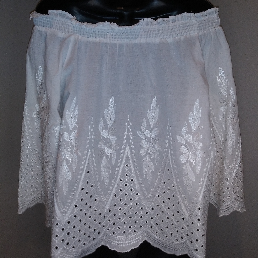 Gorgeous White Cotton off the shoulder blouse.